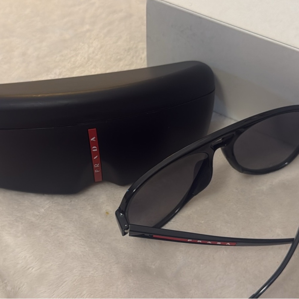 Prada Black Sunglasses with Red Accents